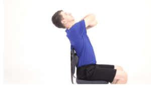 Extend upper back over your chair.